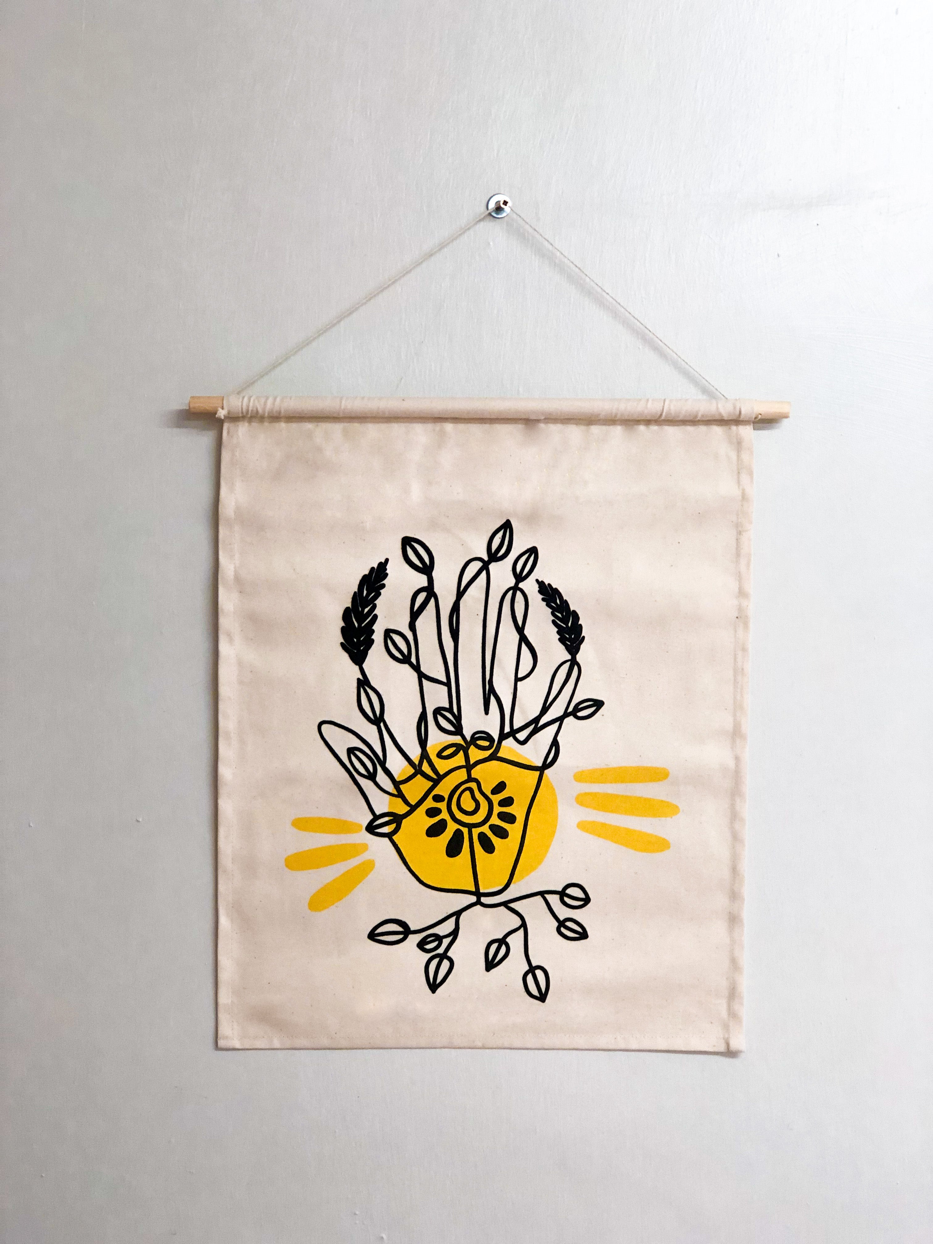 Seeds Hand Orange Wall Hanging by Lulu Kitololo