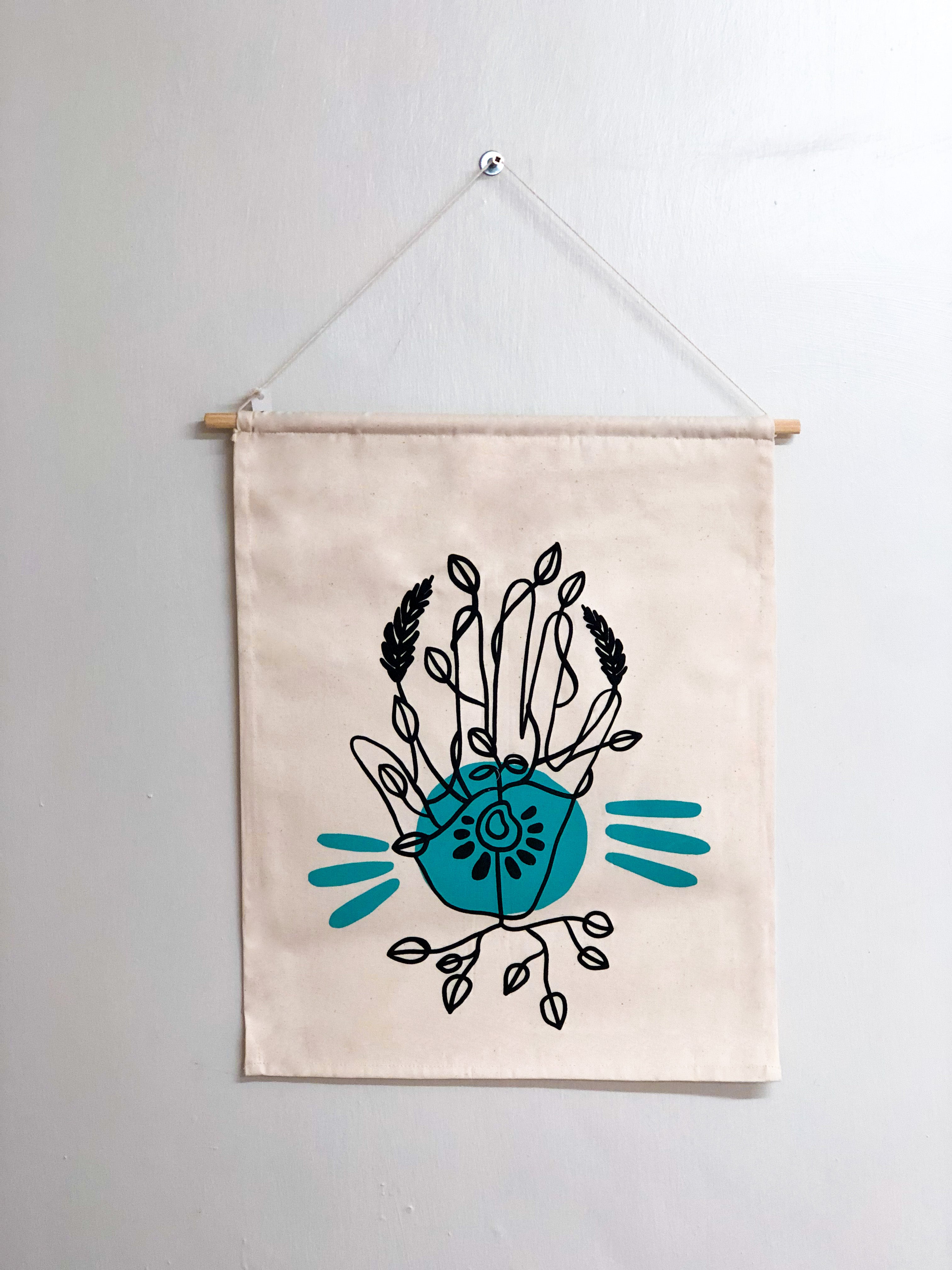 Seeds Hand Turquoise Wall Hanging by Lulu Kitololo